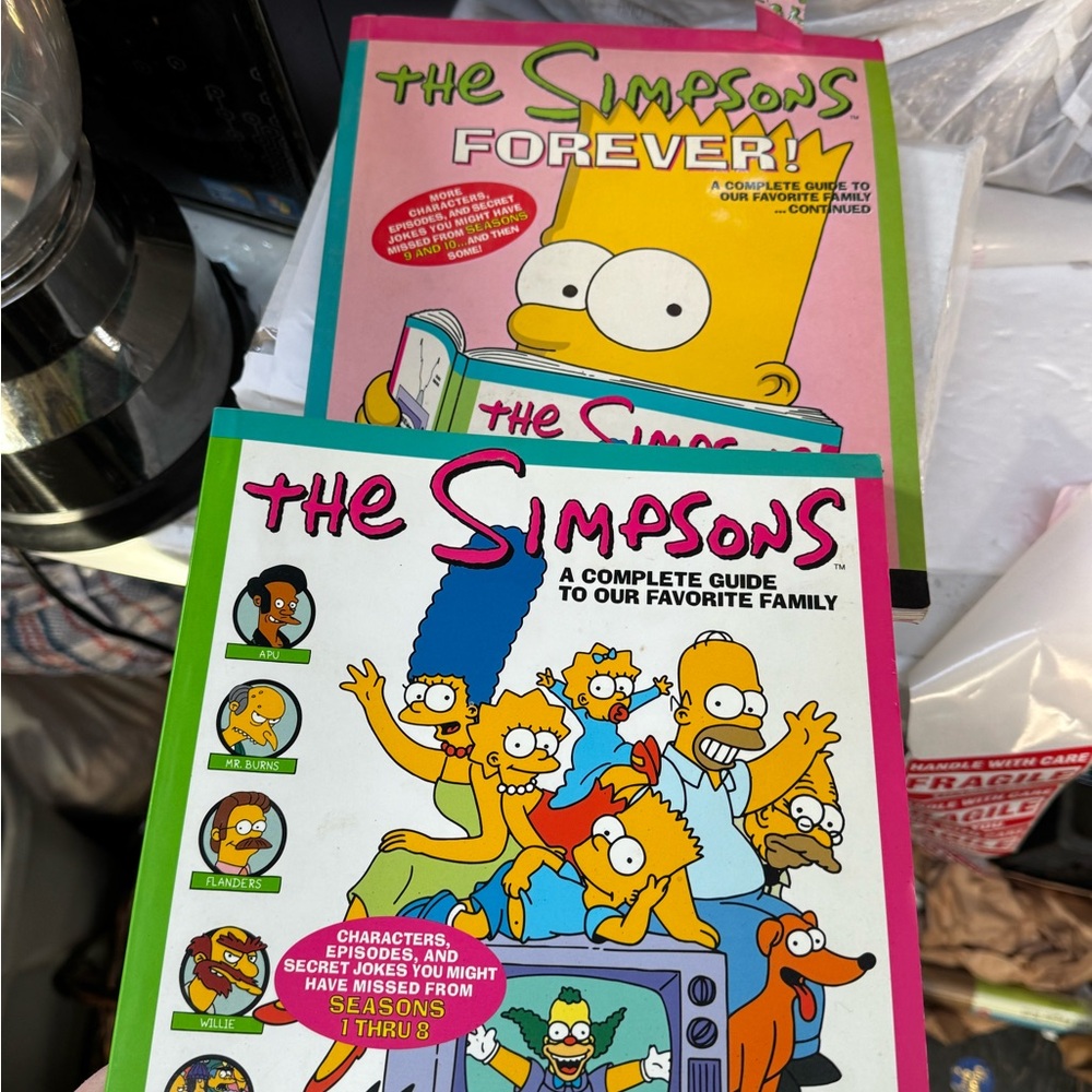 The Simpsons Forever! Guide Book - Pink & Teal Cover